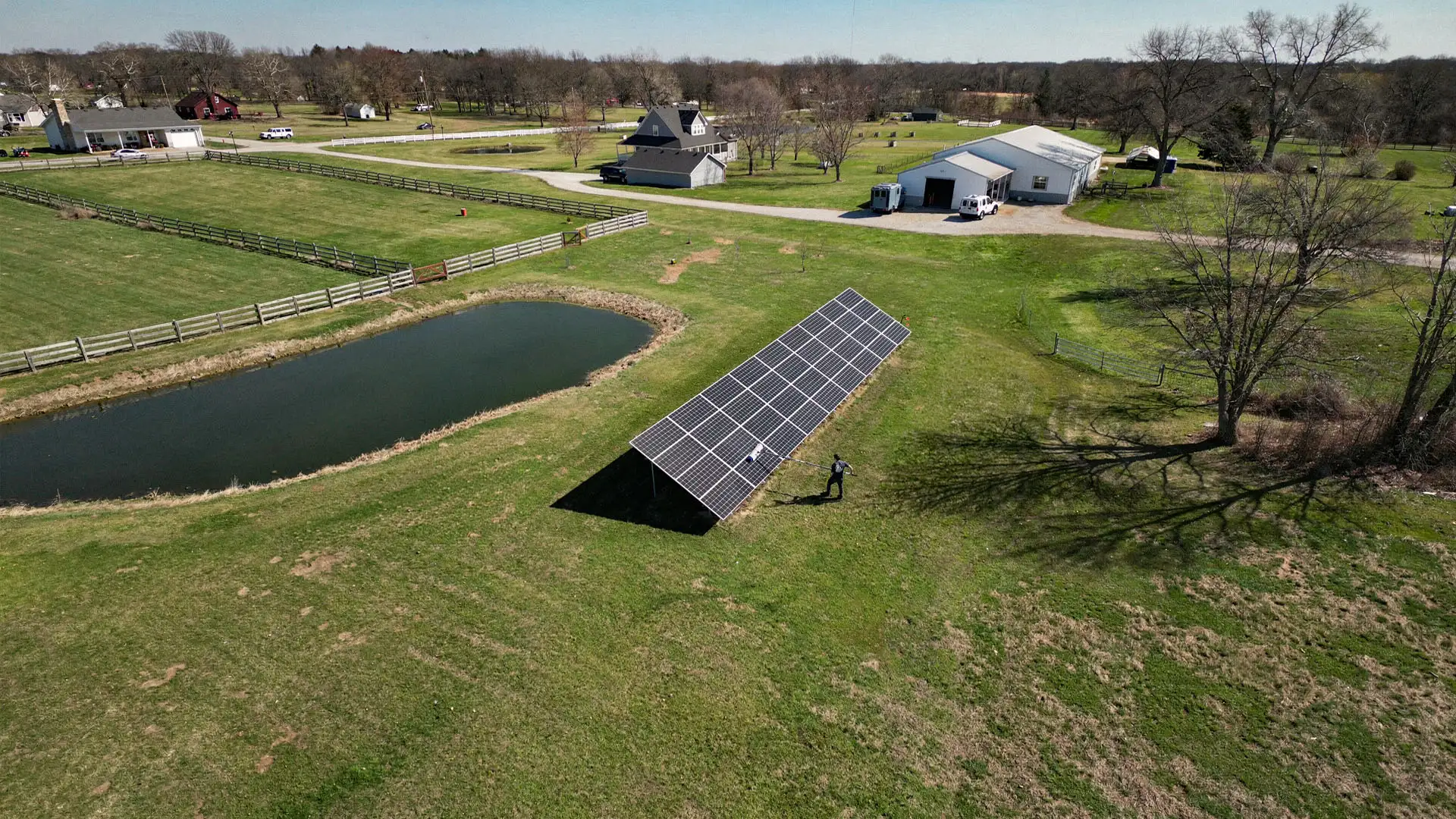 Aerial view of a Solar Scapes ground-mounted solar array at a Kansas City property